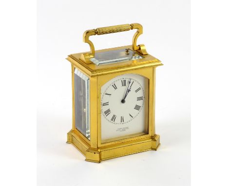 19th century double fusee repeating carriage clock in lacquered brass case with stepped canted corners, lever movement, signe
