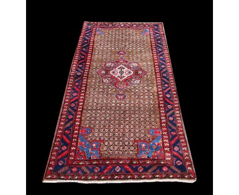 Iranian runner, with washed red ground, sarouk mir design, 325x105cms