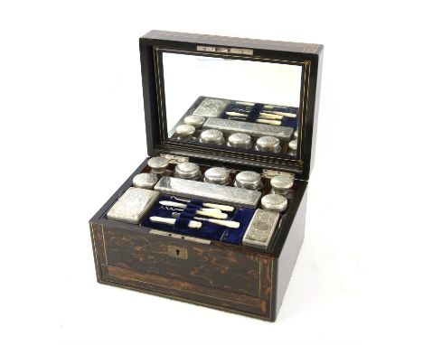 Mid 19th century Coromandel wood and brass lined dressing box, of rectangular form, the hinged lid with spring loaded mirror 
