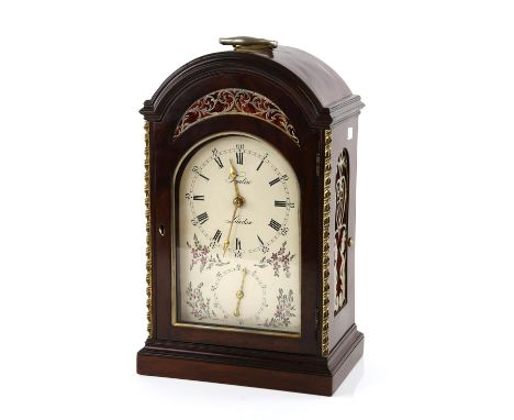 George III mahogany quarter chiming bracket clock on turntable base by Tomlin, London, the arched case surmounted by a hinged