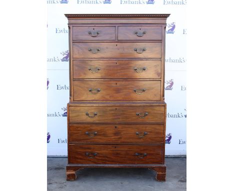 George III mahogany chest on chest, the later dentil cornice over two short and three long graduated drawers and canted flute
