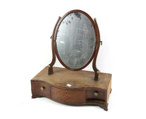 19th century mahogany dressing table mirror, with boxwood stringing, the oval plate on supports with ivory roundels over a se