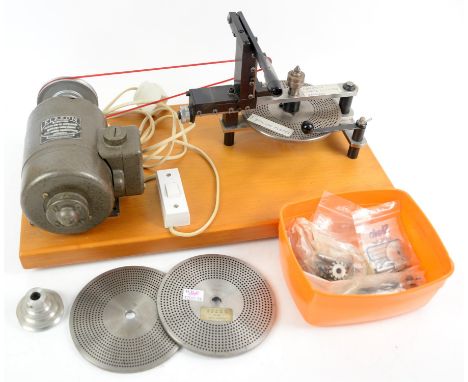 Chronos wheel cutting engine mounted with a Klaxon motor, and three division platesCondition Report:  This lot has not been t