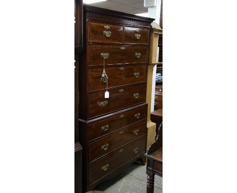 Early 19th century crossbanded mahogany chest on chest, the moulded cornice over two short and three long graduated drawers o