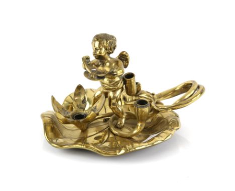 Gilt metal chamber stick in the form of a cherub holding a butterfly L19.5cm D16cm H12cm