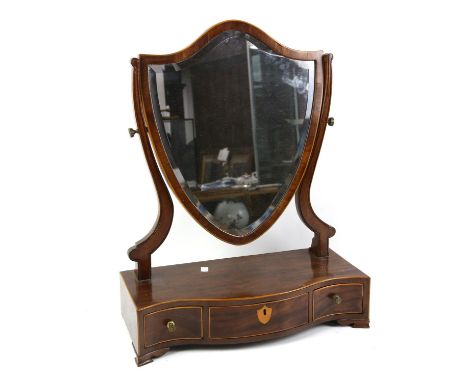 19th century mahogany framed and shield shaped dressing table mirror on serpentine base with three drawers on bracket feet, h