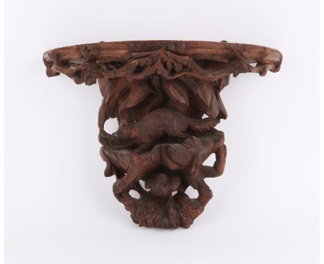 Late 19th/early 20th century Black Forest carved wall bracket, carved with a fox branches and foliage, 39 x 30 cms widePROVEN