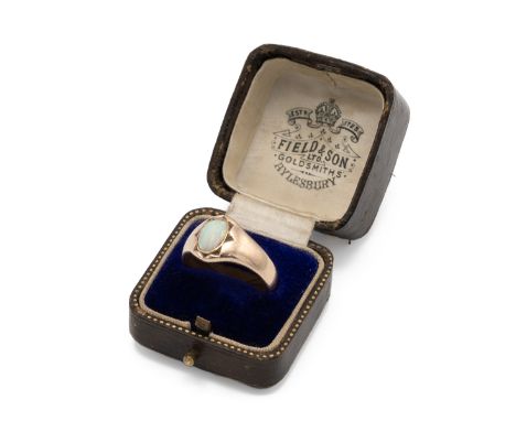 An opal set ring, the oval shallow cabochon in an unmarked rose coloured mount, finger size S, 7.4g gross.