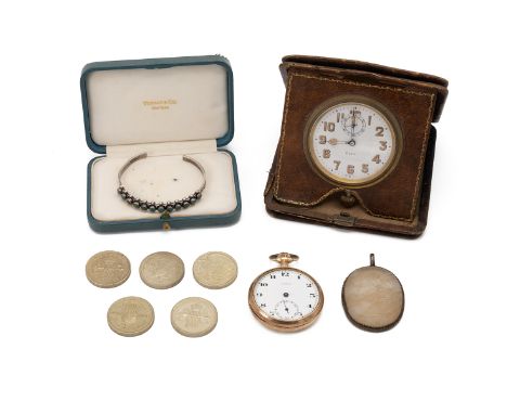Folding 8 day manual wind travel clock, early 20th century, leather case with cloth lining. 54mm white dial with gold paint A