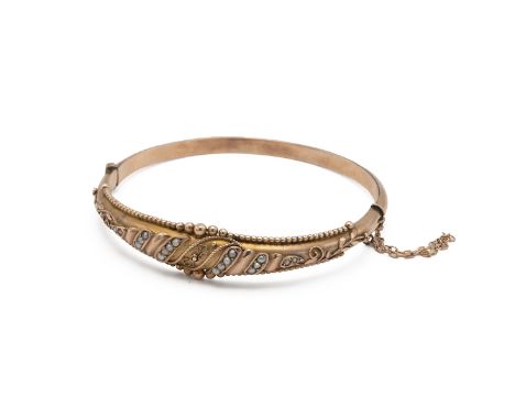 Victorian 9ct gold and seed pearl bangle, hallmarked 9ct gold, 7.5g gross weight.