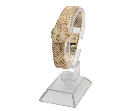 Vintage lady's Omega 9ct gold manual cocktail watch. Circa 25g Gold case and bracelet, brushed gold dial with gold batons and