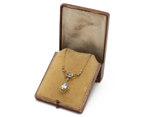 Edwardian aquamarine, diamond and seed pearl pendant necklace, the closed backdrop with an oval cut above, with seed pearl po