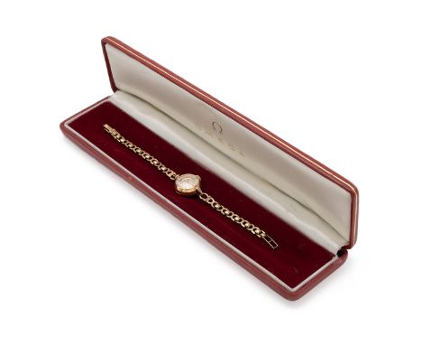 Omega vintage lady's 9ct yellow gold bracelet watch. 17mm case, manual wind, cream dial with gold hour markers and alpha hand