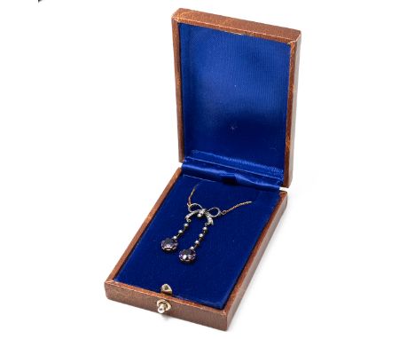 Edwardian style diamond, amethyst and seed pearl negligee pendant, the rose cut set ribbon bow with two line drops below with