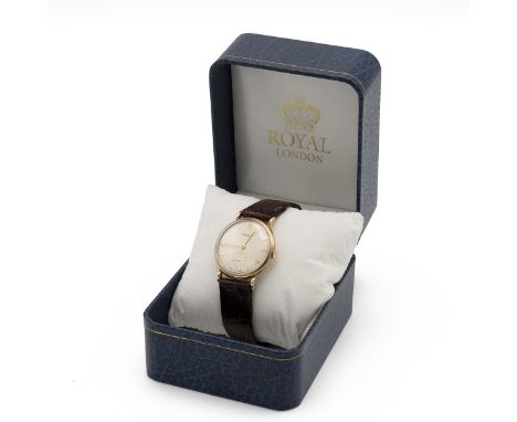 Rotary 9ct Gold Men's manual wind wristwatch. Cream dial with gold numerals, hour markers and batons. Subsidiary seconds dial