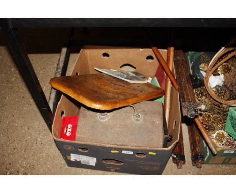 A box and contents of various advertising items; a tin trunk; walking sticks; easel etc. 