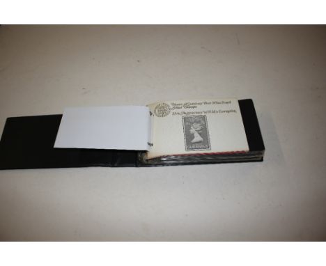 An album of Guernsey First Day covers and stamps