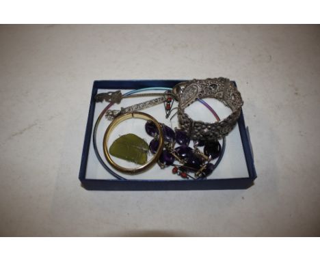 A white metal bangle, a yellow metal snap bangle various other items etc.
