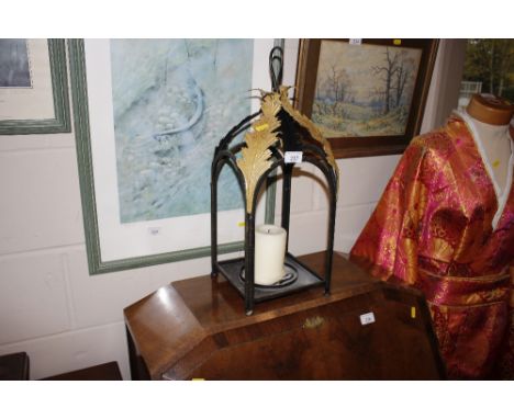 A metal candle lantern 