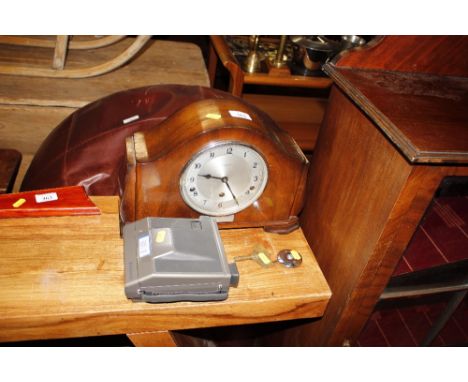A Croydon &amp; Sons mantel clock with presentation plaque; and a Polaroid Image System camera  