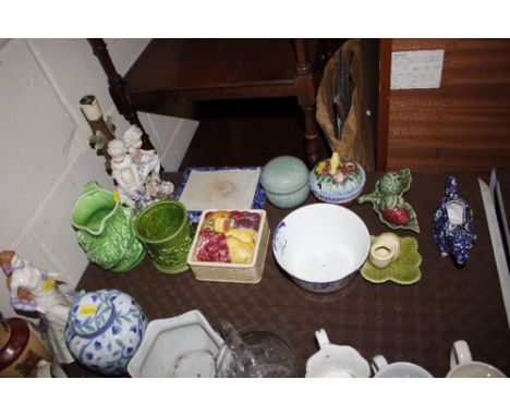 Various decorative china to include blue and white cow creamer, figural decorated table lamp, blue and white slot bowl etc