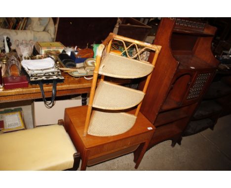 A bamboo three tier corner shelf