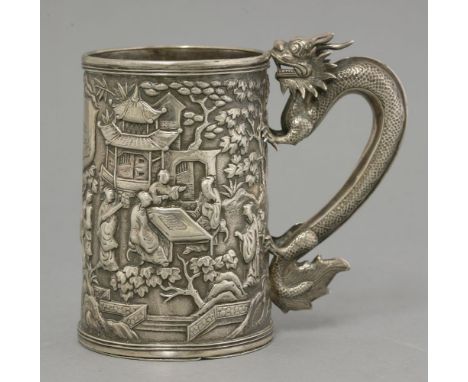A Chinese silver Mug,mid-19th century, marked for Sunshing, decorated with figures playing go, reading scrolls and playing qi