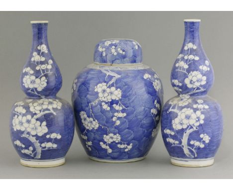 A blue and white Jar and Cover,mid-19th century, attractively painted with prunus and cracked ice, the domed cover matching,2