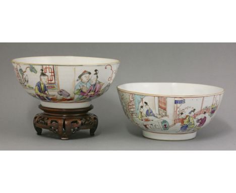 Two famille rose punch bowls, each with figures playing cards, or a woman doing tapestry work, or generally making merry, 20.