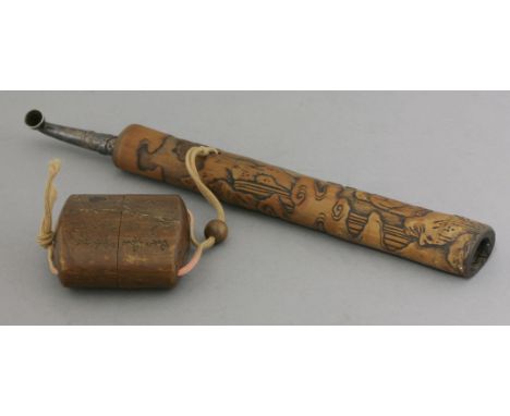 An interesting bamboo Kiseruzutsu,probably early 19th century, carved after a Chinese original with a scholar standing on a r