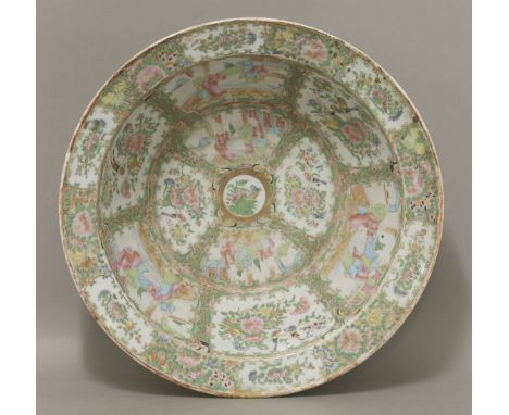 A Canton deep Basin,c.1880, the well and base painted with key fret bordered panels of figures, the rim with bats and panels 