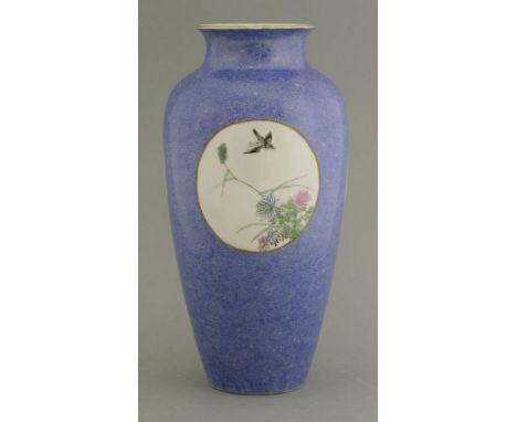 A finely potted porcelain Vase,Republic Period (1912-1949), the elongated ovoid body with millefleurs in the bright blue enam