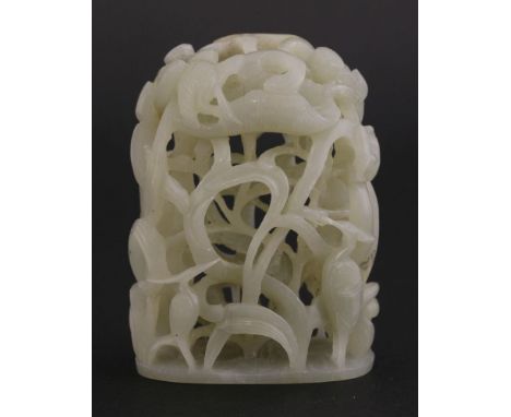 A good jade Hat Finial,in style of Yuan, but later, with egrets amongst swirling weeds, the top with lotus, leaves and buds, 