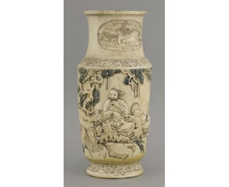 An ivory Vase,Republic period (1912-1949), the slightly tapering body well carved in relief and tinted in green and red with 