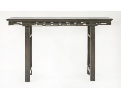 A Hongmu Scroll Table,late 19th century, the rectangular top above a bead and cloud fret apron, on square legs with scroll fe
