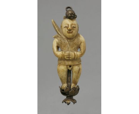 An ivory Figure of a Boy,first half of the 18th century, wearing a diapered smock and holding two lotus leaves, his hair tied