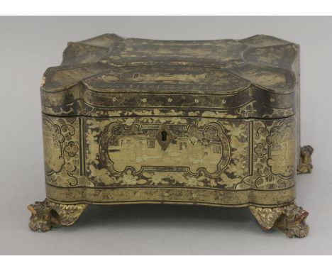 A tea caddy, c.1800, two pewter containers set within an elaborately shaped casket gilt with figure scenes, flowers and feath