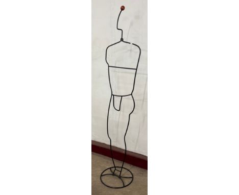A black metal wire mannequin 