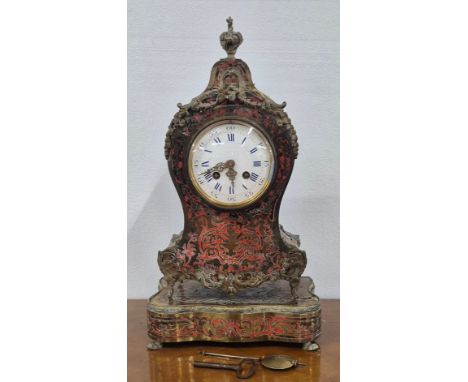 A French Napoleon III Boulle work and gilt metal mounted mantel clock on stand, movement signed Japy Freres, 42cms h