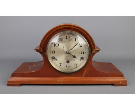 A Westminster mantel clock with pendulum and key