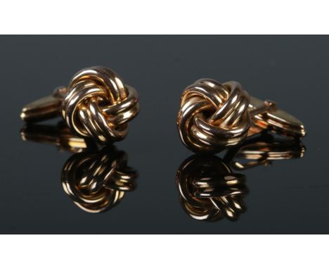 A pair of 9ct gold knot cufflinks. 6.39g.
