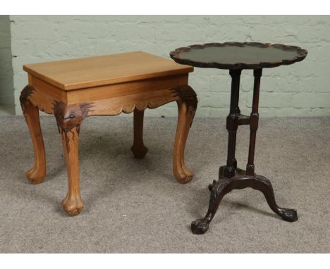 A small Oriental style table with dragon mask decoration along with a small mahogany tripod wine table.