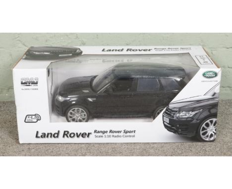A boxed CMJ Land Rover scale 1:10 RC car "Range Rover Sport", box size W66 x D29 x H26cm.