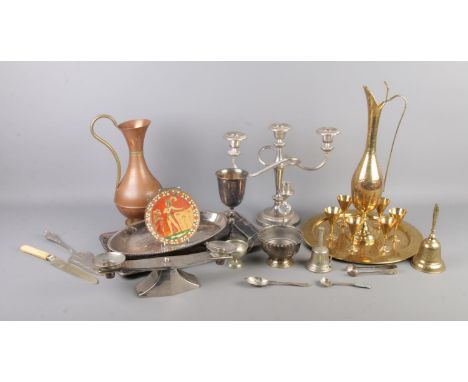 A box of assorted metalwares, to include Eastern tray, ewer and glasses, Gallery 19 candelabra, wall plaque, goblet and bell 