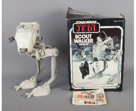 A vintage 1980s Palitoy "Star Wars Return of the Jedi-Scout Walker Vehicle", boxed with stickers.  Box in bad condition.