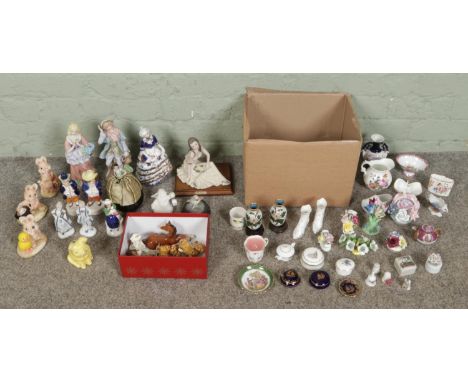 Two boxes of assorted ceramic ornaments and figurines, including Limoges trinkets, Italian A.Belcari lady figurine etc.