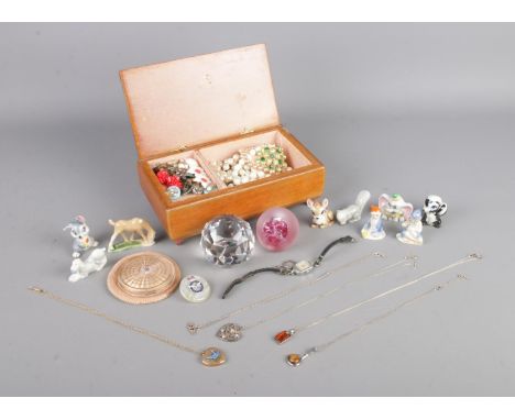 An Australian wooden box of mainly costume jewellery. To include Zenette compact bearing RAF insignia, 10ct Gold lined swallo