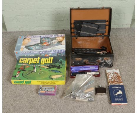 Two a vintage suitcase with contents of miscellaneous to include Scalextric, toy model animals, hip flask, etc. Along with bo