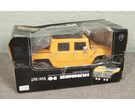 A boxed Rastar scale 1:6 RC car "Hummer H1 SUV", box size W74 x D41 x H38cm.  Box show wear and tear.