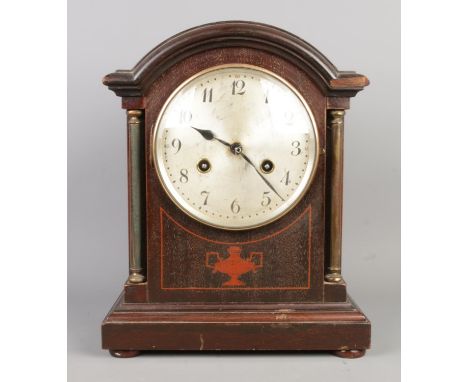 An early 20th century German oak inlay striking mantel clock by Junghans Wurttemberg, Arabic numerals, pendulum present, no k